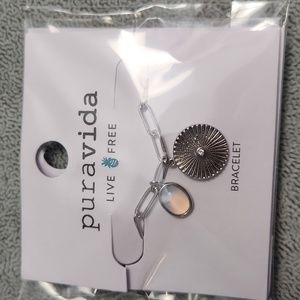 Silver bracelet with charm